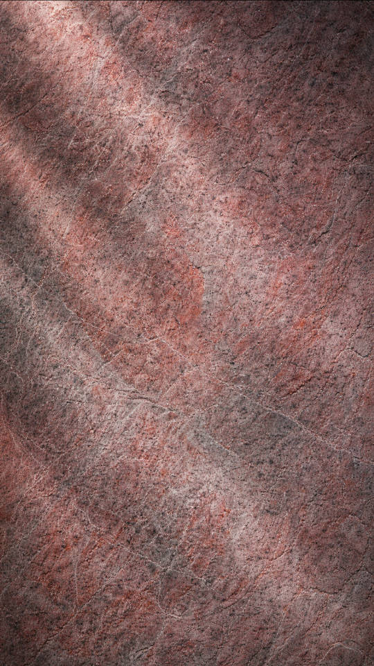 Surface en quartzite naturelle aux nuances minérales vibrantes